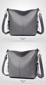 Detailed front and side view of grey pebbled leather bucket bag with tassel charms