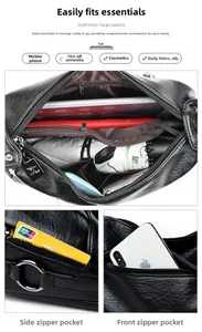 Detail view of multi-layer zipper compartments in a black lychee texture leather bag