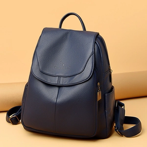 Women's dark blue litchi pattern leather backpack with adjustable straps and logo detail