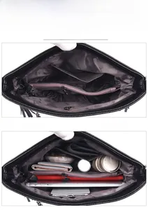 Interior view showing the large capacity and multi-compartment design of the black bucket bag