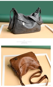 Close-up of litchi texture material and metallic logo pendant on women's crossbody bags