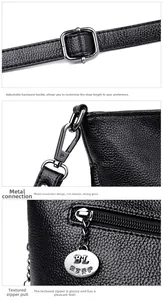 Detail of adjustable metal buckle and lychee grain leather texture on black bucket bag
