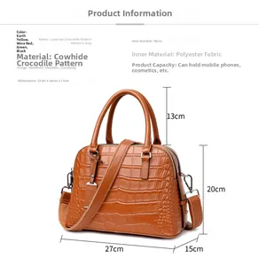 Detail view of crocodile pattern leather handbag showing dimensions 27x20x15cm size