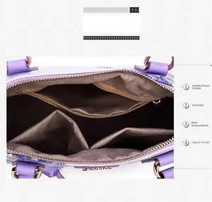 Top view of lavender shell bag interior showing pocket compartments and brown lining