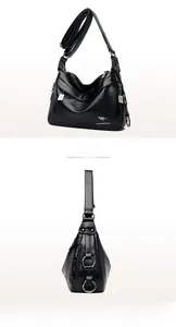 Detail of black pebbled leather crossbody bag with adjustable strap and side ring accent
