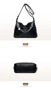 Detail view of the back and bottom of a black hobo bag with silver kangaroo charm