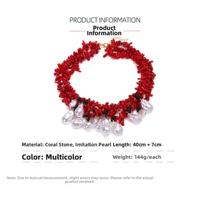 Detail view of red coral and baroque pearl necklace measuring 40cm with 7cm chain extender