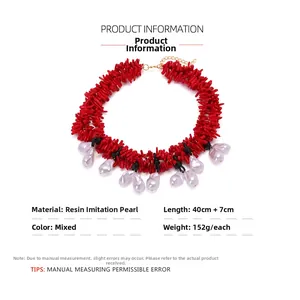 Detail view of red branch resin elements and imitation pearls with 40+7cm size specs
