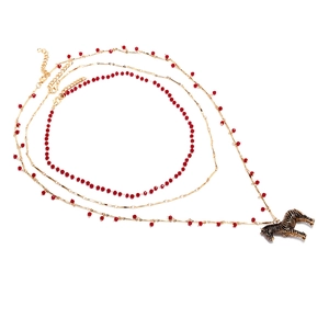 Collier à trois rangs dorés avec perles rouges et pendentif zèbre rétro