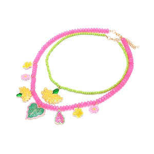 Layered beaded necklace featuring colorful enamel flower pendants and macaron beads