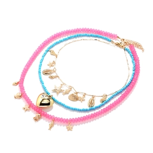 Multi-layer beach necklace with pink and blue beads, gold starfish, shell and heart charms