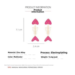 Detailed view of creative fishbone earrings with me lettering and size measurements