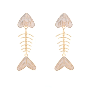 Detail of fishbone drop earrings with white enamel finish and me! lettering