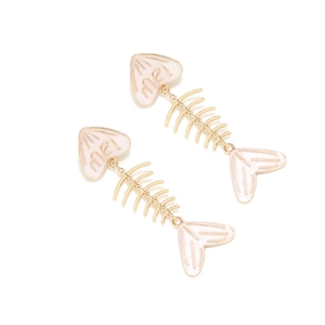 Detailed view of fishbone earrings featuring pink enamel hearts and golden metal texture