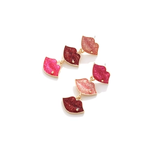 Exaggerated pink and red enamel lip drop earrings with glitter finish and gold alloy links