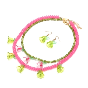 Handmade beaded flower necklace and earrings set with pink beads and trumpet floral pendants