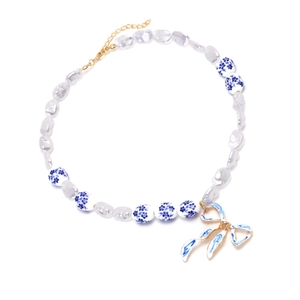 Baroque pearl and blue porcelain floral bow necklace with gold plated chain clasp