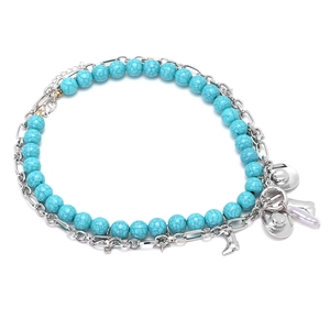 Detail of double-layer necklace with denim style hat, boot charms and blue stone beads