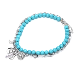 Western style layered necklace with turquoise beads, cowboy hat and boot pendants