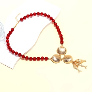Summer tropical beaded necklace with red coral beads and golden shell fish tail pendants