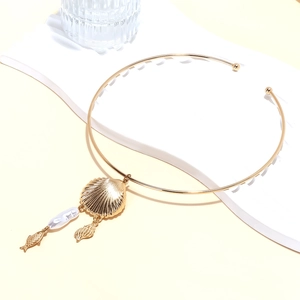 Golden choker necklace with baroque pearl and shell pendants for summer ocean style