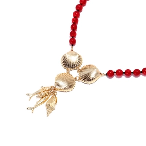 Handmade red beaded necklace with golden alloy seashell and tropical fish ocean pendants