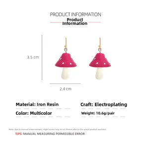 Detailed view of pink mushroom earrings with 3.5cm height and resin texture details