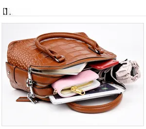 Internal capacity of brown crocodile pattern handbag with dual zippers and large space