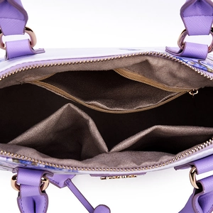 Internal view of floral shell handbag featuring zip pocket and multi-purpose compartments