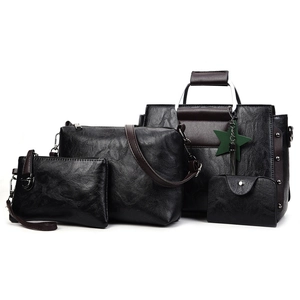 Ensemble 4 pièces de sacs en cuir noir grainé avec pampille étoile et anses brunes