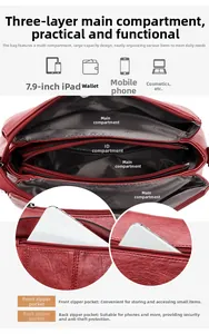 Detailed view of red crossbody bag with multi-layer zipper compartments and soft PU leather