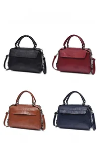 Boston crocodile texture handbags shown in black, red, brown and blue with silver hardware