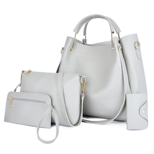 Ensemble de 4 sacs à main gris en similicuir avec détails dorés et multiples styles de port