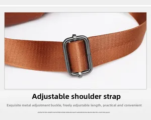 Detail of dark brown nylon strap with adjustable dark grey metal slider buckle