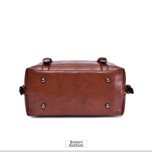 Brown oil wax leather Boston bag bottom with four silver metal protective feet