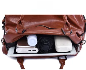 Top view of spacious brown oil wax leather tote bag showing large interior storage capacity