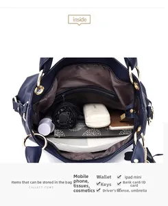 Interno della borsa shopper blu scuro con ampio scomparto principale e tasca interna