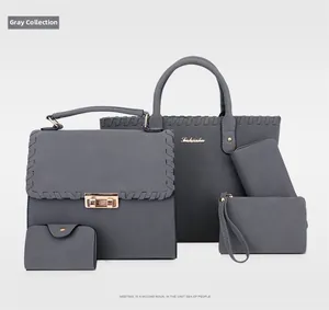 Détail de l'ensemble de 5 sacs gris mats avec finitions de coutures tressées élégantes