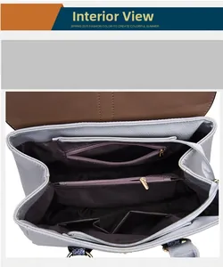 Innenansicht der Damenhandtasche mit zwei Reißverschlussfächern und drei Steckfächern