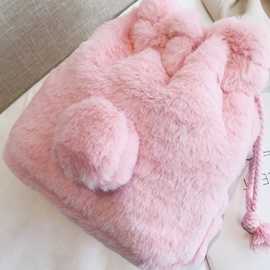 Pink plush bunny drawstring bucket bag with sparkling fur and rabbit ears for winter