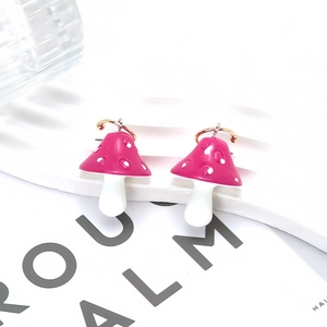 Colorful mushroom drop earrings with red enamel polka dot caps and gold hooks