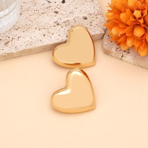 Retro oversized gold heart alloy earrings for women featuring a polished metallic finish