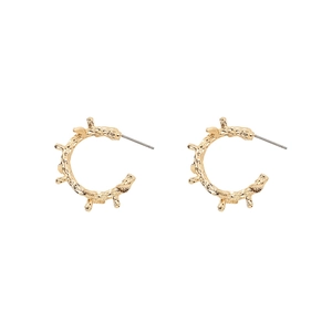 Vintage C-shaped thorn textured hoop earrings in gold plating with a branch design