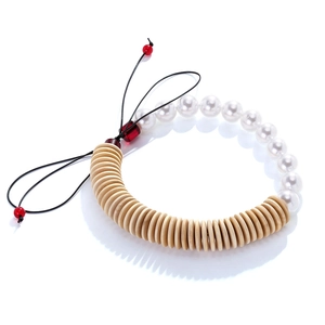 Handmade necklace with wood beads and imitation pearls in a geometric vintage style