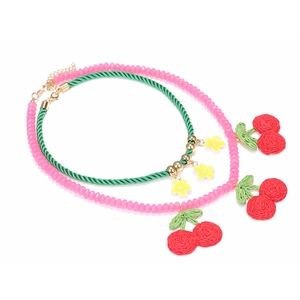 Handmade cherry pendant necklace and yellow flower braided chain in a two-piece set
