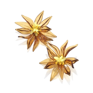 Detailed view of handmade beaded floral earrings with amber translucent petals and yellow center