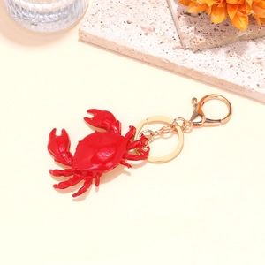 Creative red crab keychain with polished finish and gold-tone lobster clasp for bags