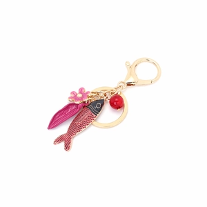 Porte-clés poisson émaillé avec charm fleur rose et fermoir mousqueton doré