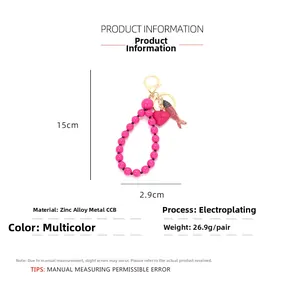 Detailed size chart of beaded tropical fish keychain with heart charm and alloy clasp