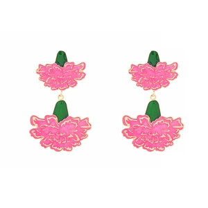 Enamel carnation drop earrings in pink and green with gold metal accents on white background